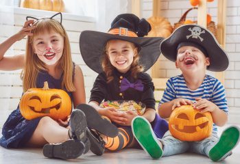 children dressed up in halloween costumes